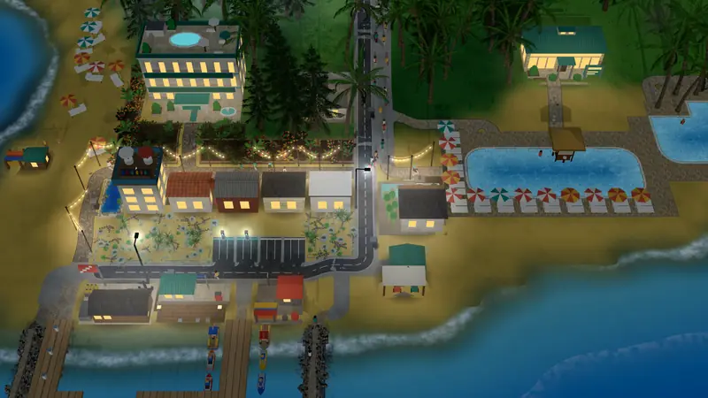 The harbour at night, shops and pools lit